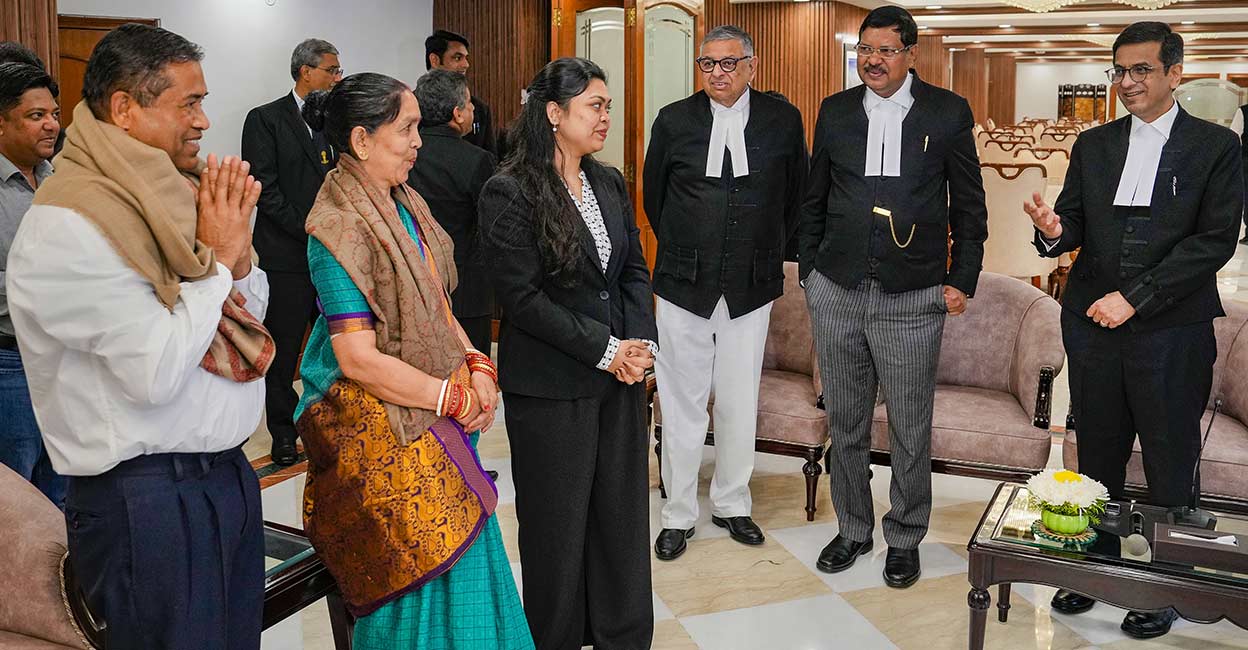Pragya Pragya (third from left), who got a scholarship to study masters in law in two different universities in the US, with parents during her felicitation by the Supreme Court judges, at the Supreme Court of India in New Delhi, Wednesday. Photo: PTI/Shahbaz Khan