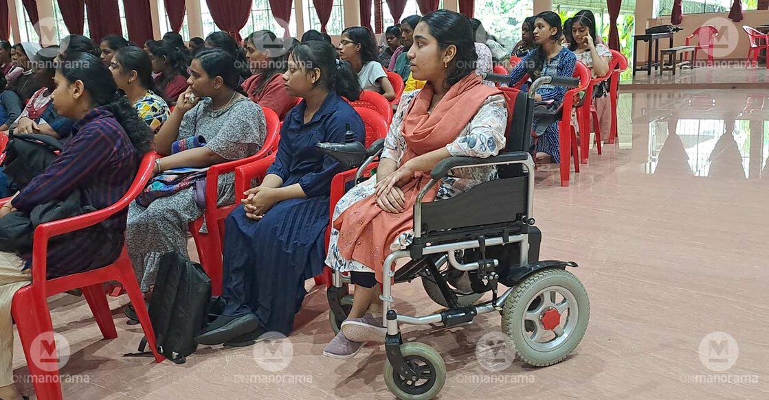 Asna, who suffers from spinal muscular atrophy, attending an event at the Sacred Heart College, Chalakudy. Photo: Special Arrangement