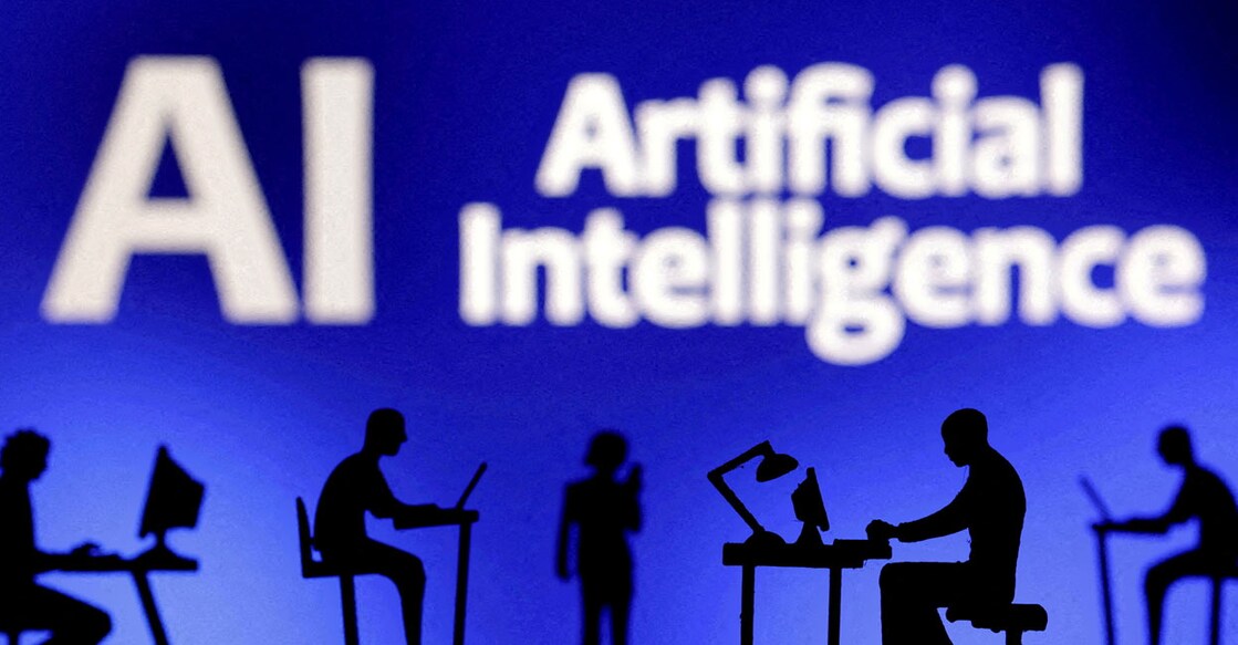 AI Figurines with computers and smartphones are seen in front of the words "Artificial Intelligence AI" in this illustration taken, February 19, 2024. File Photo: REUTERS/Dado Ruvic/Illustration