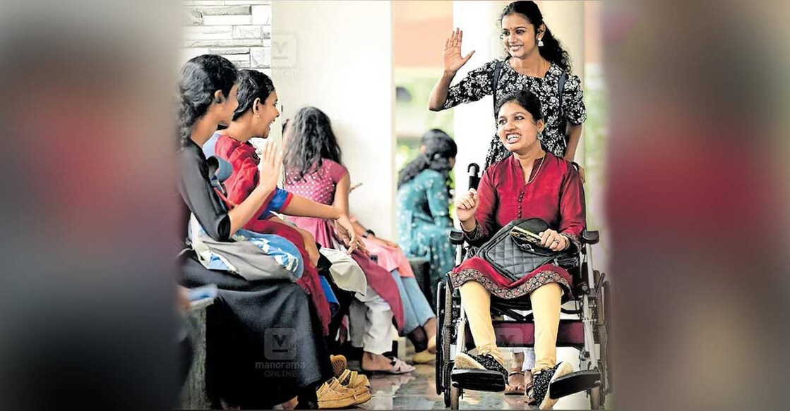 K Devana and Charithra Ashok greeting friends at the Payyannur College campus. Photo: Manorama