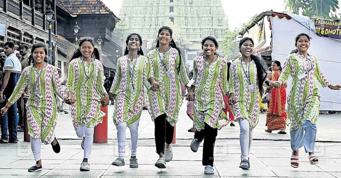 attappadi-kalolsavam Students of the Attappadi Model Residential School in front of the Padmanabhaswamy Temple. Photo: Manorama.