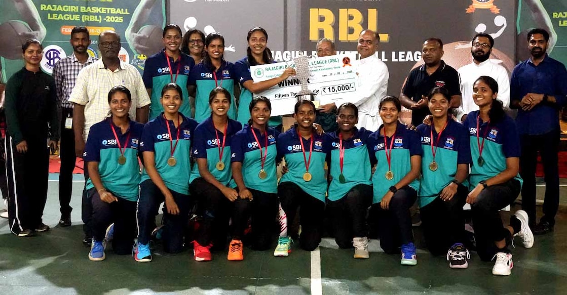 Rajagiri Basketball League (RBL) 2025 women's champions Assumption College team pose for a family photocall after winning the crown. Photo: Special Arrangement