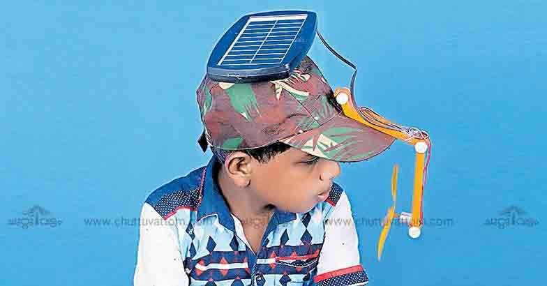 Student backer designs hat with solar-powered fan for Chandrababu
