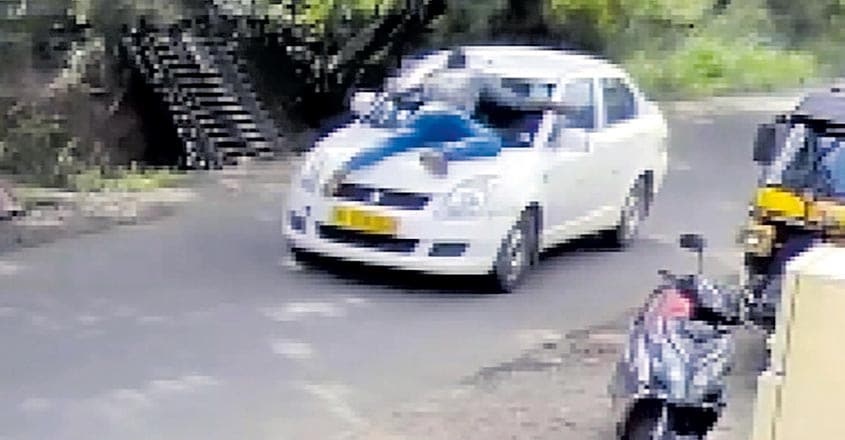 Youth clings on to bonnet as car driver speeds away on Kochi road after ...