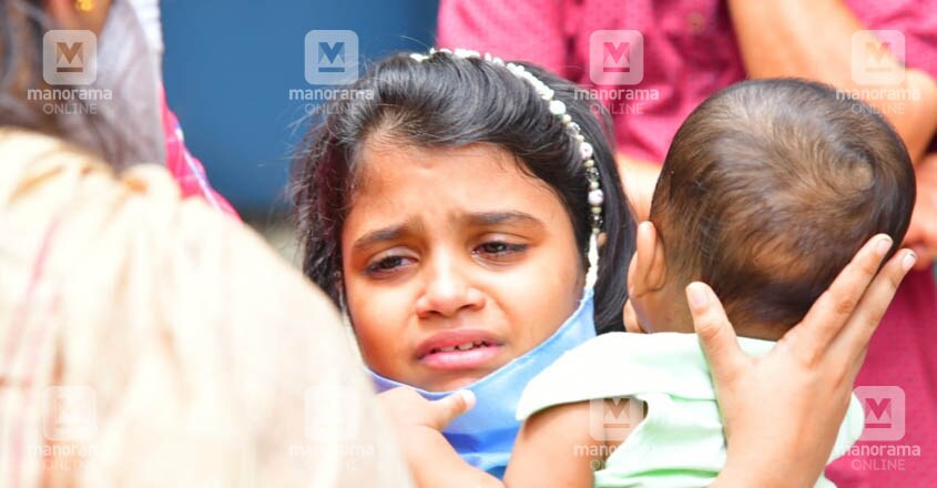 Doctor Mary hands over infant to Covid cured parents after a month of baby-sitting Doctor Mary hands over infant to Covid cured parents after a month of baby-sitting