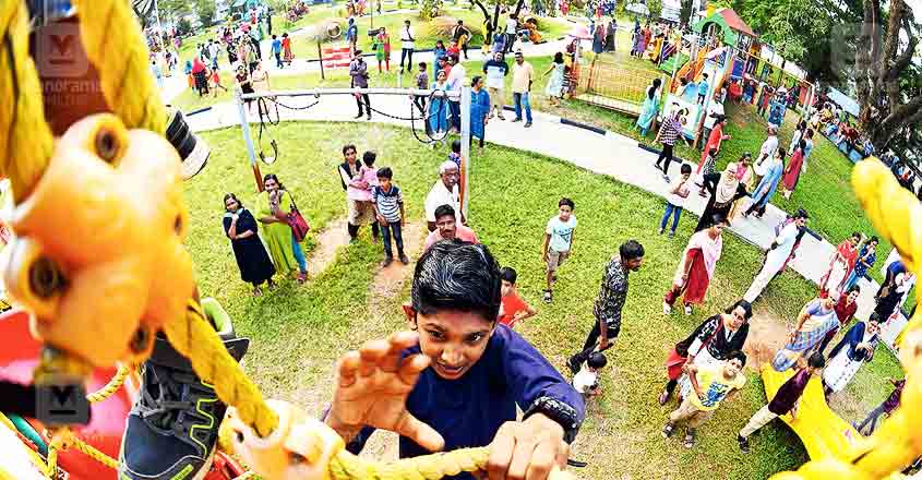Children, adults throng renovated civic park Children, adults throng renovated civic park