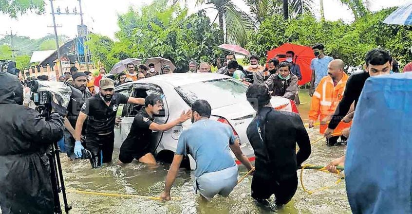 Rescue efforts in vain, youth killed after car swept away by floodwaters in Kottayam Rescue efforts in vain, youth killed after car swept away by floodwaters in Kottayam
