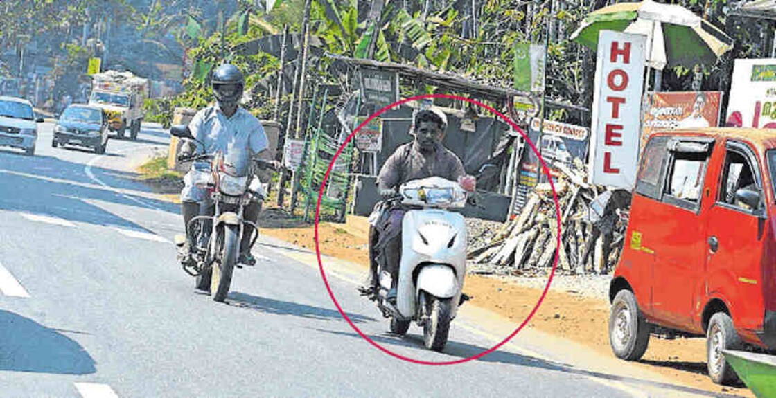 rider-helmet Koduvalli motor vehicle inspector V V Francis took the photo on February 1 to bring to book the rider who was not wearing a helmet.