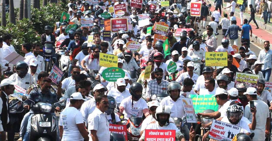 People take part in a voter awareness rally ahead of Madhya Pradesh Assembly elections, in Bhopal, Sunday, Oct. 29, 2023. Photo: PTI