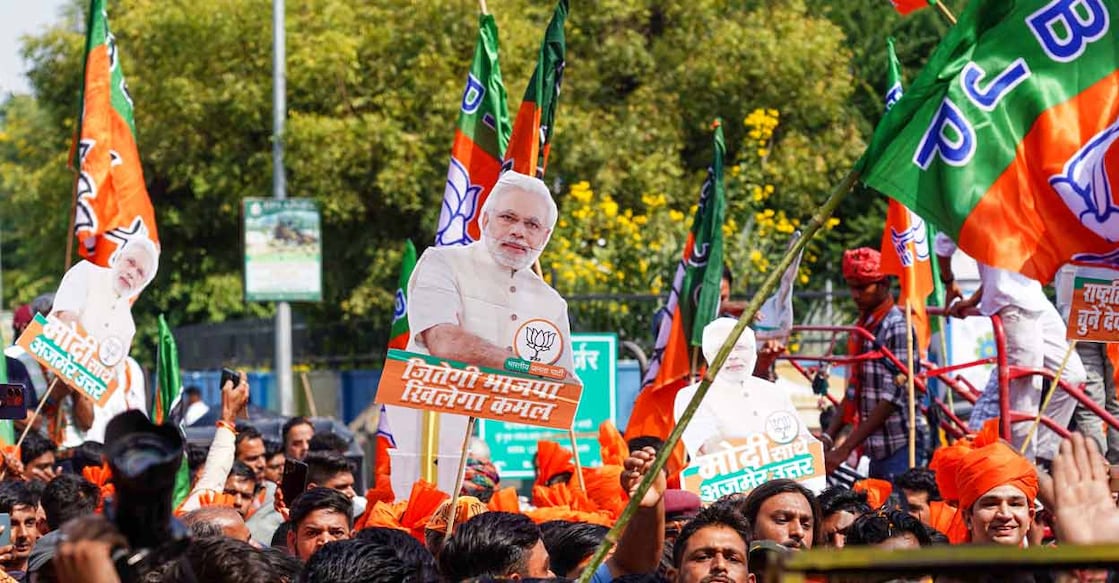 BJP workers and supporters during a rally for filing of nomination papers of a party candidate for the upcoming Rajasthan Assembly elections, in Ajmer, Friday, Nov. 3, 2023. Photo: PTI