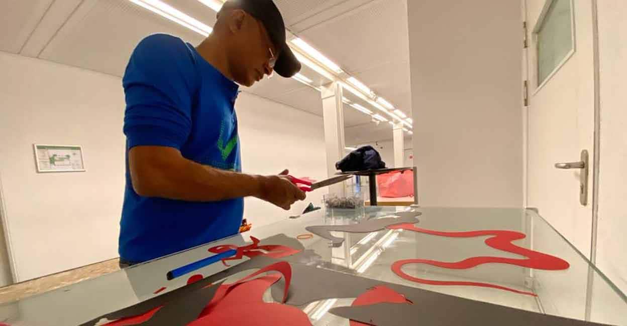 upendranath-berlin-works Upendranath gives final touches to his installation at the show. Photo: Special arrangement