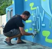 Travelling artist Peter Klar's graffiti unveiled on Kochi Metro property