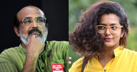 Thomas Isaac and actress Parvathy