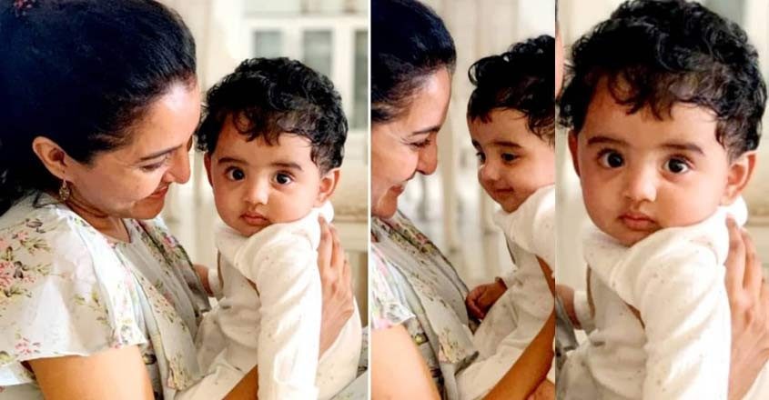 Manju Warrier shares pics with Kunchacko and family on Izahaak's birthday