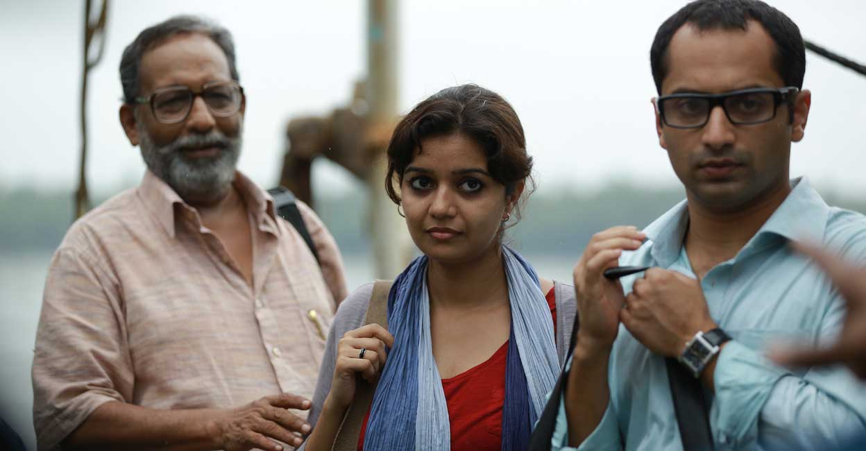 Nedumudi Venu Nedumudi Venu with Swathi Reddy and Fahadh Faasil in movie 'North 24 Kaatham'.