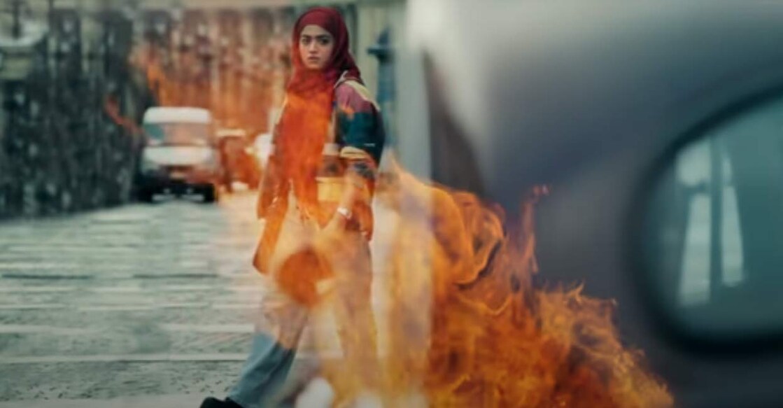 Rashmika Mandanna is spotted wearing a red-coloured hijab and a striped shrug 