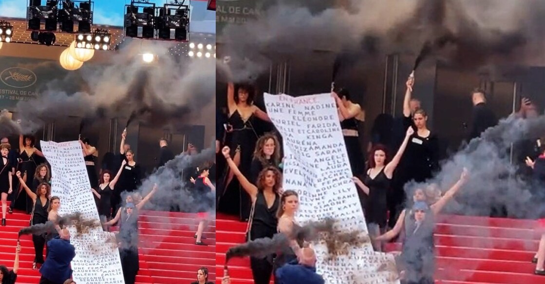 Women protesters release smoke from handheld devices and display a long banner at the premiere of Iranian film, 'Holy Spider'. Photo: IANS (@TheGregoryE/Twitter)