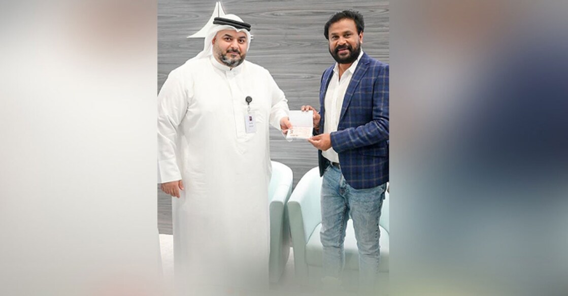 Actor Dileep receiving his Golden Visa in Dubai. Photo: Twitter