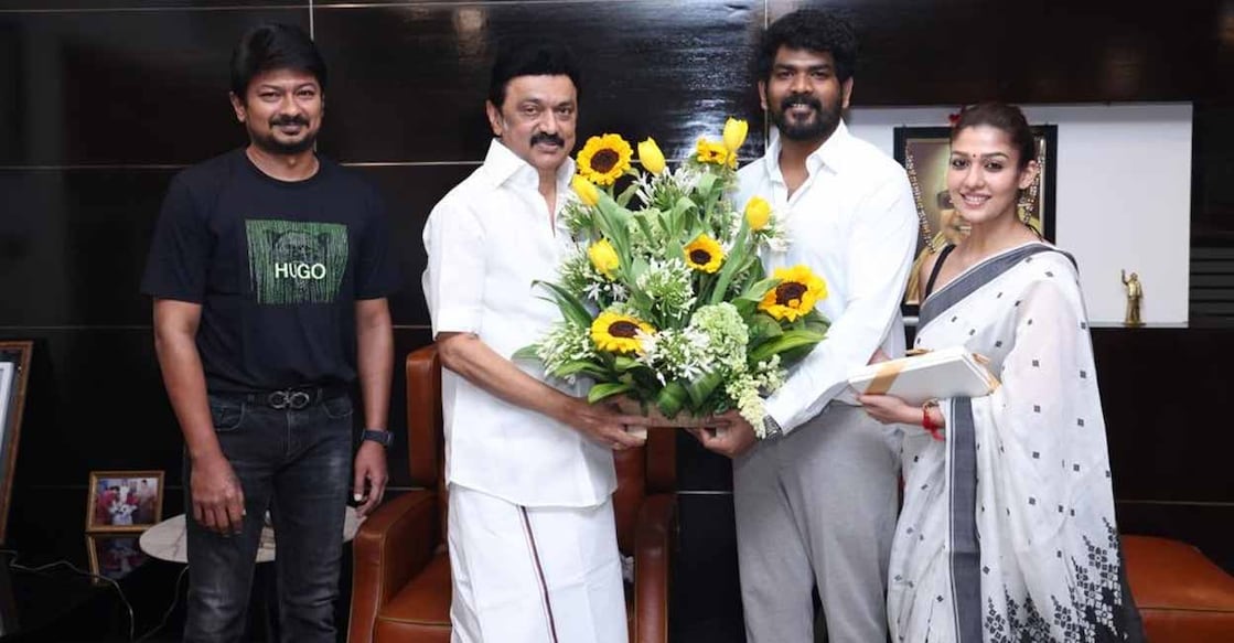 The couple is seen posing with Chief Minister M K Stalin and his son. Photo: Twitter The couple is seen posing with Chief Minister M K Stalin and his son. Photo: Twitter