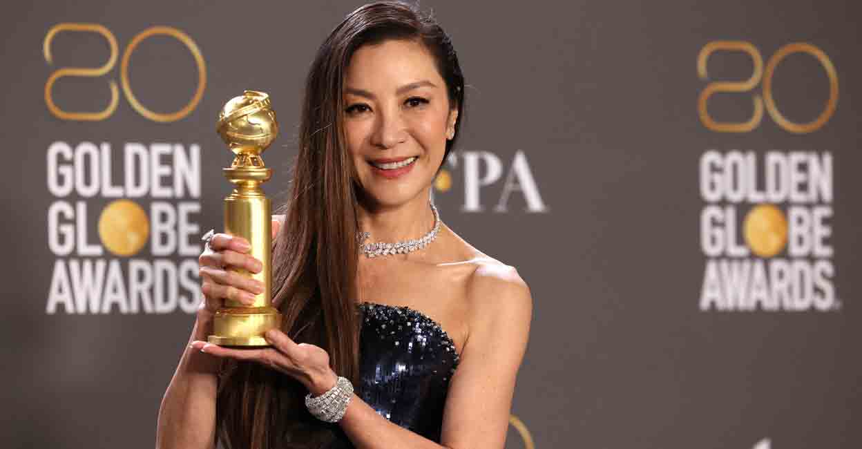 AWARDS-GOLDEN-GLOBES Michelle Yeoh poses with her award for Best Actress in a Musical or Comedy Motion Picture for "Everything Everywhere All at Once" at the 80th Annual Golden Globe Awards in Beverly Hills, California, U.S., January 10, 2023. REUTERS/Mario Anzuoni