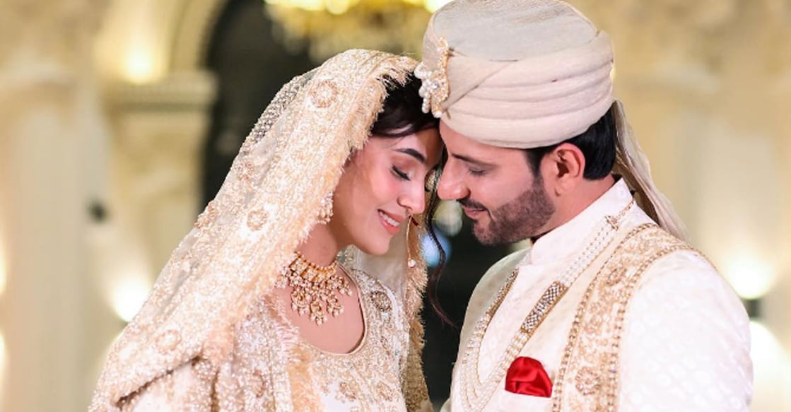 Andleeb looked mesmerising in off-white and golden ensemble, with matching jewellery, while Ali wore a matching sherwani. Photo | @alimercchant
