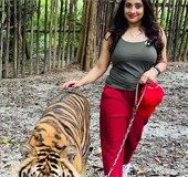 Poojitha Menon’s daring ‘catwalk’ with a tiger stuns netizens