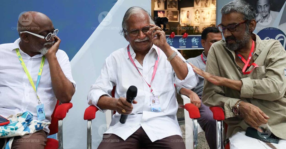 (From left) Bose Krishnamachari, Sreekumaran Thampi and Ranjith share a light moment. Photo: Onmanorama