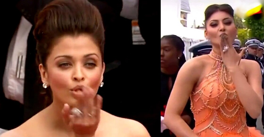 Urvashi wore an orange layered floor-sweeping gown as she walked the red carpet. Photo: IANS