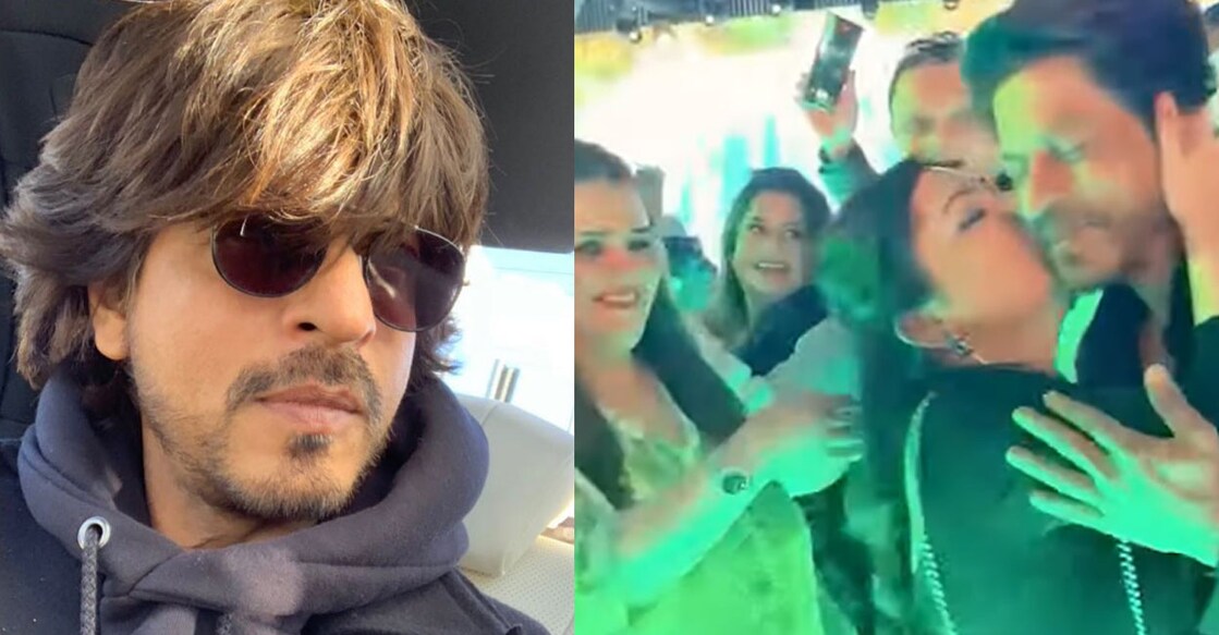 Khan is seen walking on the stage with his bodyguards when a young woman unexpectedly walks to him and plants a kiss on his cheek. Video still: YouTube shorts