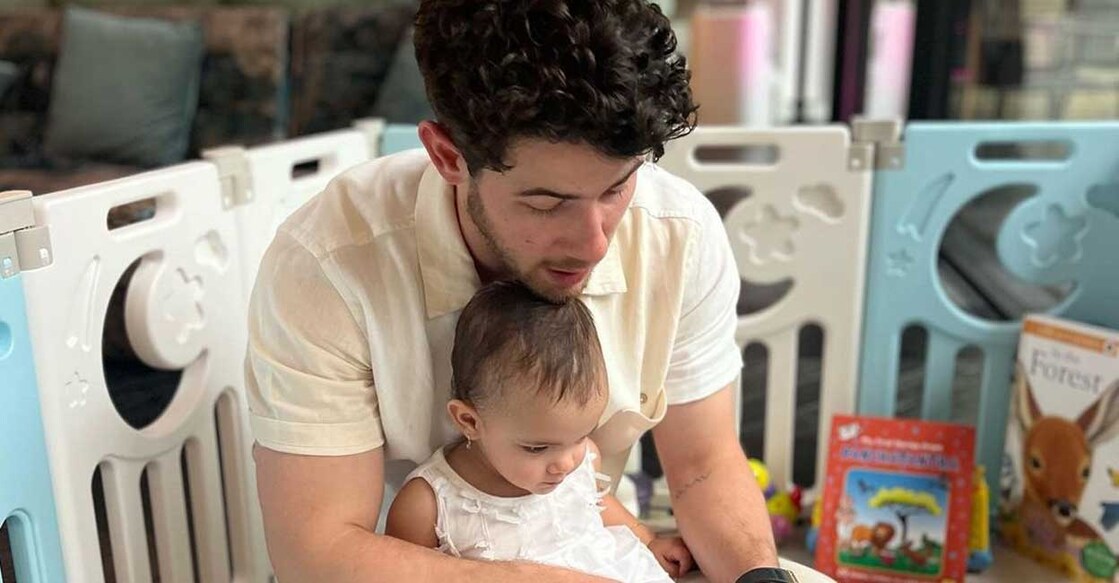 In the first picture, Nick can be seen reading a children's book to Malti. Photo: Instagram/Priyanka Chopra