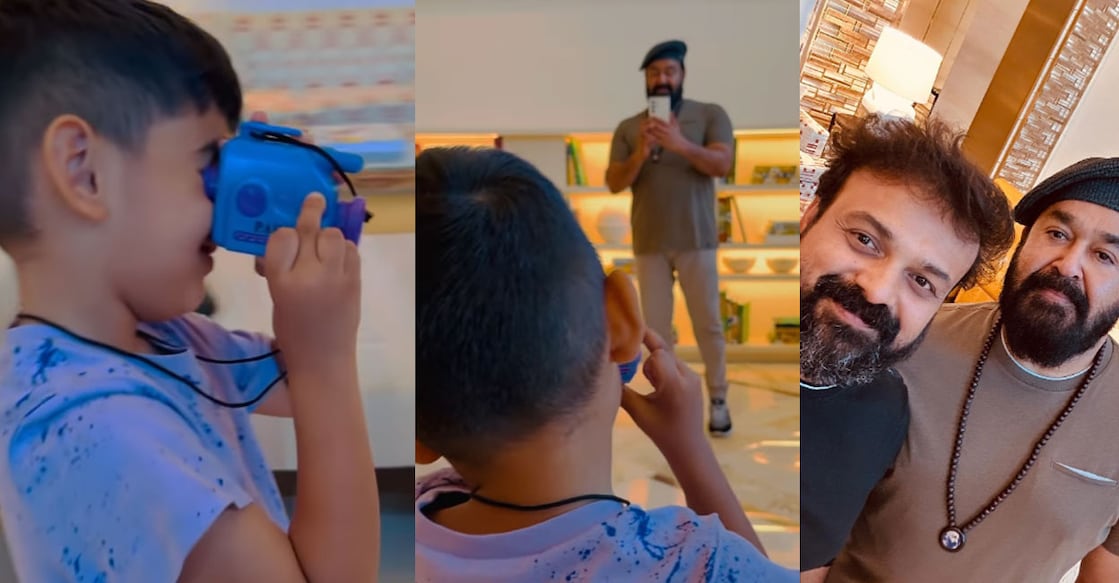 Izahaak's cute reaction was captured by Mohanlal on his phone. Photo: Instagram | @kunchacks
