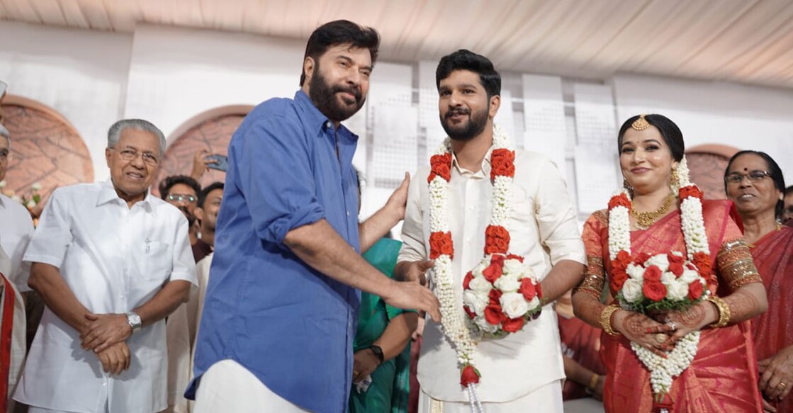 Superstar Mammootty greets the newlyweds, Harikrishnan and Aswathi. Photo: Special arrangement