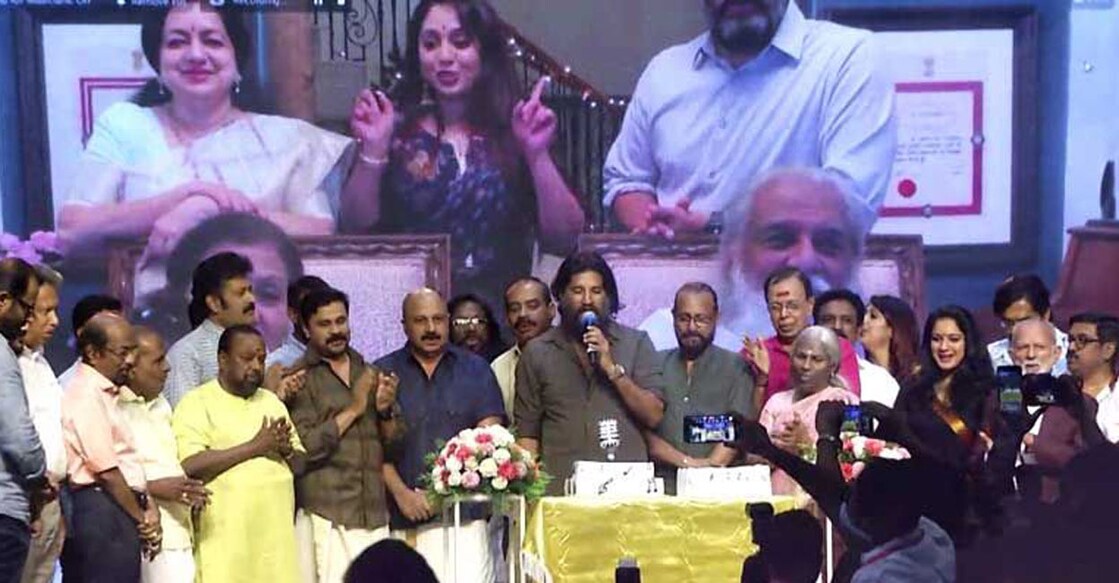 Musician and Yesudas's elder son Vijay cut the birthday cake on behalf of his father. Photo | Manorama News