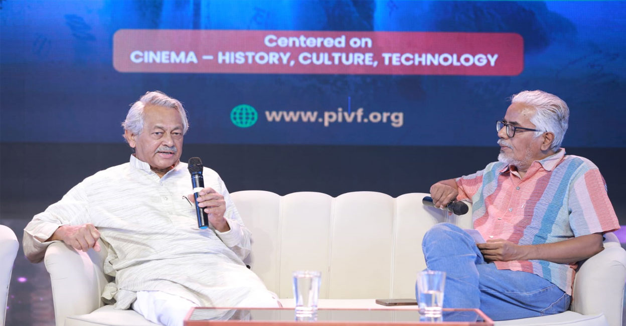 Girish Kasaravalli (left) interacts with film critic C S Venkiteswaran at the second edition of Peruvanam International Village Festival at Sreelakam Convention Centre in Peruvanam, Thrissur, on Saturday. Photo: Special arrangement