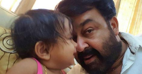 Photo of the day: Mohanlal sharing a secret with a little angel