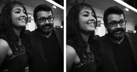 Guess who is this pretty girl with Mohanlal