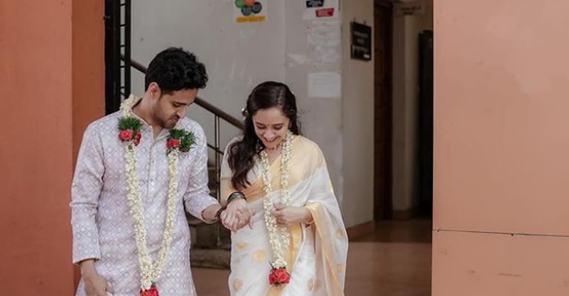 Anju and Aditya looked radiant in their wedding attire. Photo: Instagram