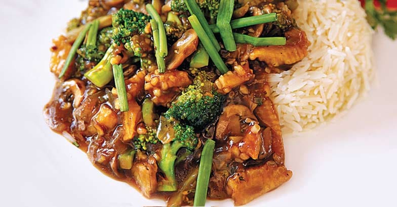 Stir fried mushroom and broccoli on rice Stir fried mushroom and broccoli on rice
