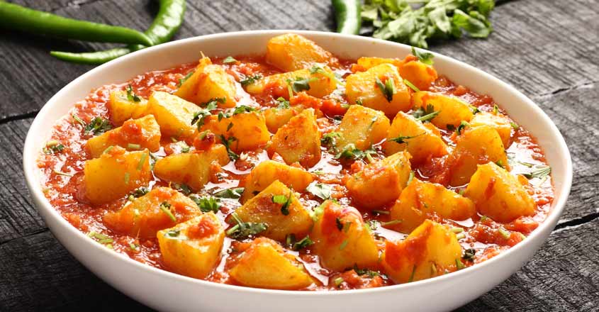 Try this special potato and tomato curry Try this special potato and tomato curry