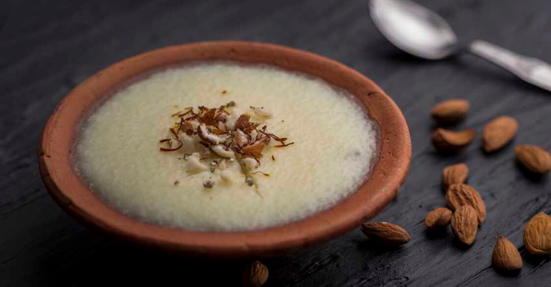 phirni - sweat rice pudding or dessert made with grinded rice , milk, sugar and nuts