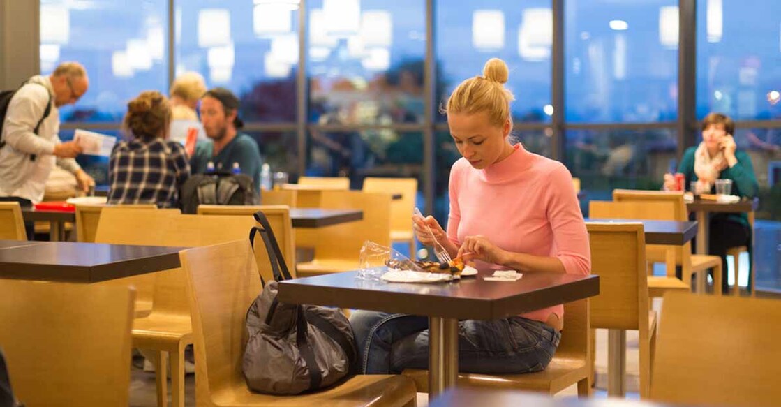 Want to cut food intake? Dine alone | Shutterstock