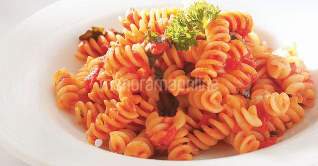 Pasta in Tomato Sauce Pasta cooked in loads of tomato sauce, this vegetarian dish is a tasty way to ward off hunger pangs.