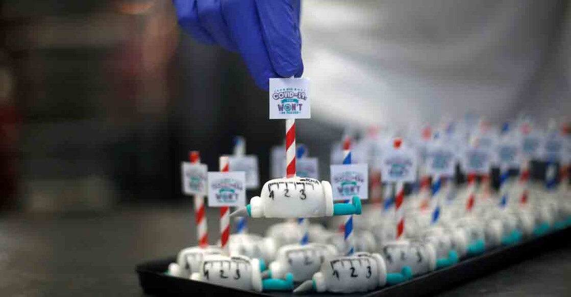 Cakes in the shape of syringes are seen at the Schuerener Backparadies bakery, as the vaccination rollout against coronavirus disease (COVID-19) continues, in Dortmund, Germany, January 9, 2021. REUTERS/Leon Kuegeler     TPX IMAGES OF THE DAY