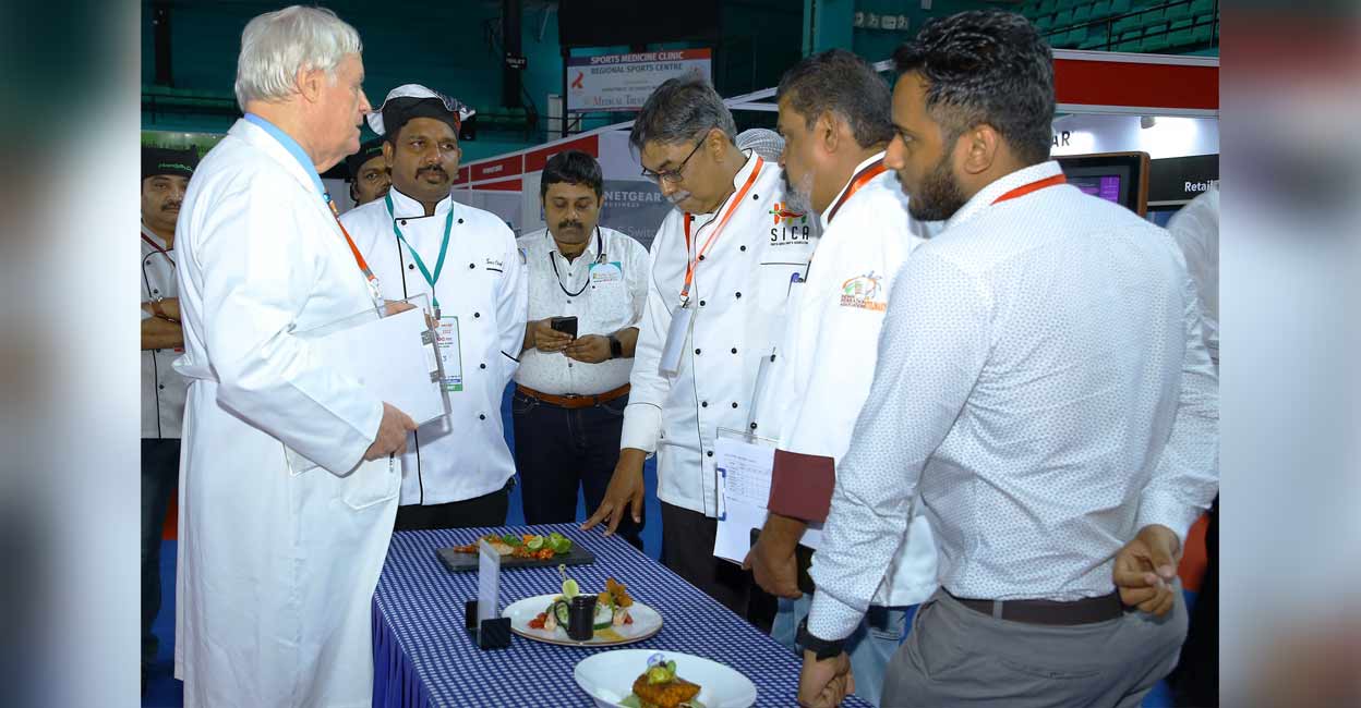 Jury comprising celebrity chef Alan Palmer and Chefs Rasheed and George K George make an assessment of dishes at the Kerala Culinary Challenge. Photo: Special arrangement