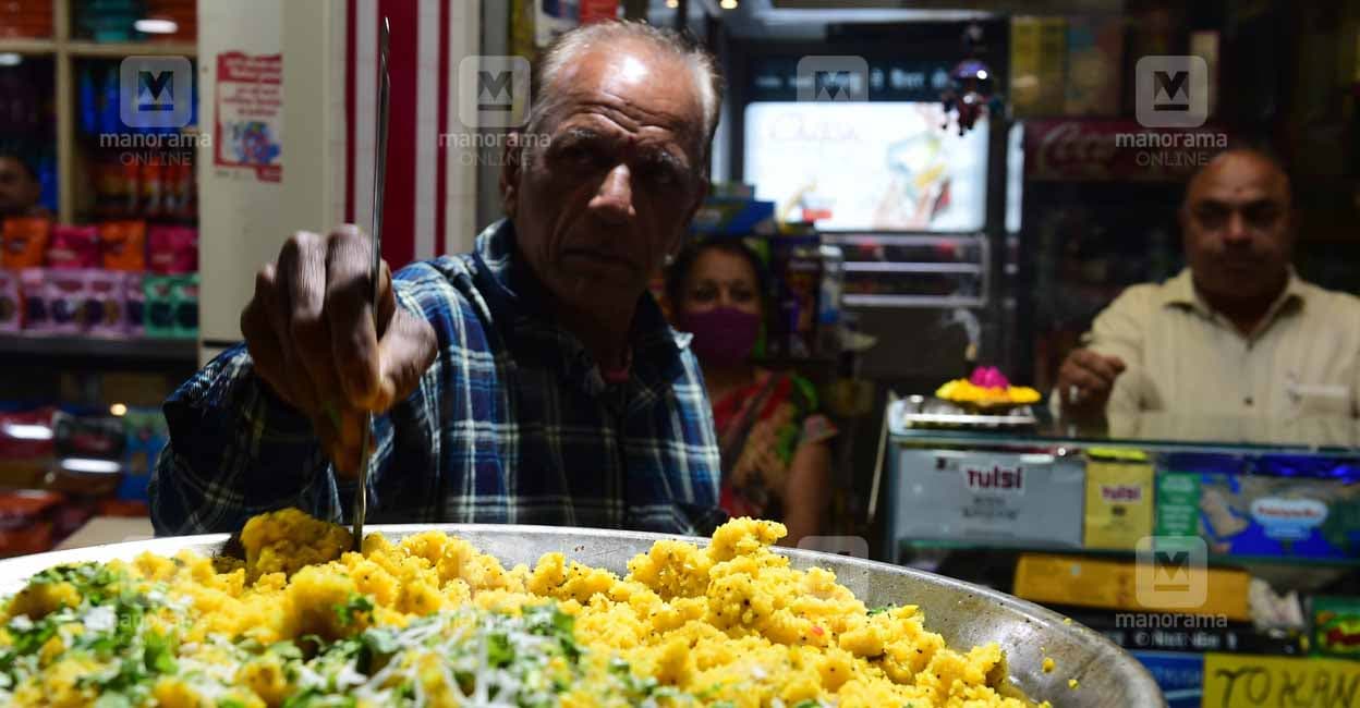chappan-dukan-2 The stores in Chappan Dukan begins selling freshly prepared hot poha as early as 6 am. Photo: Tony Dominic