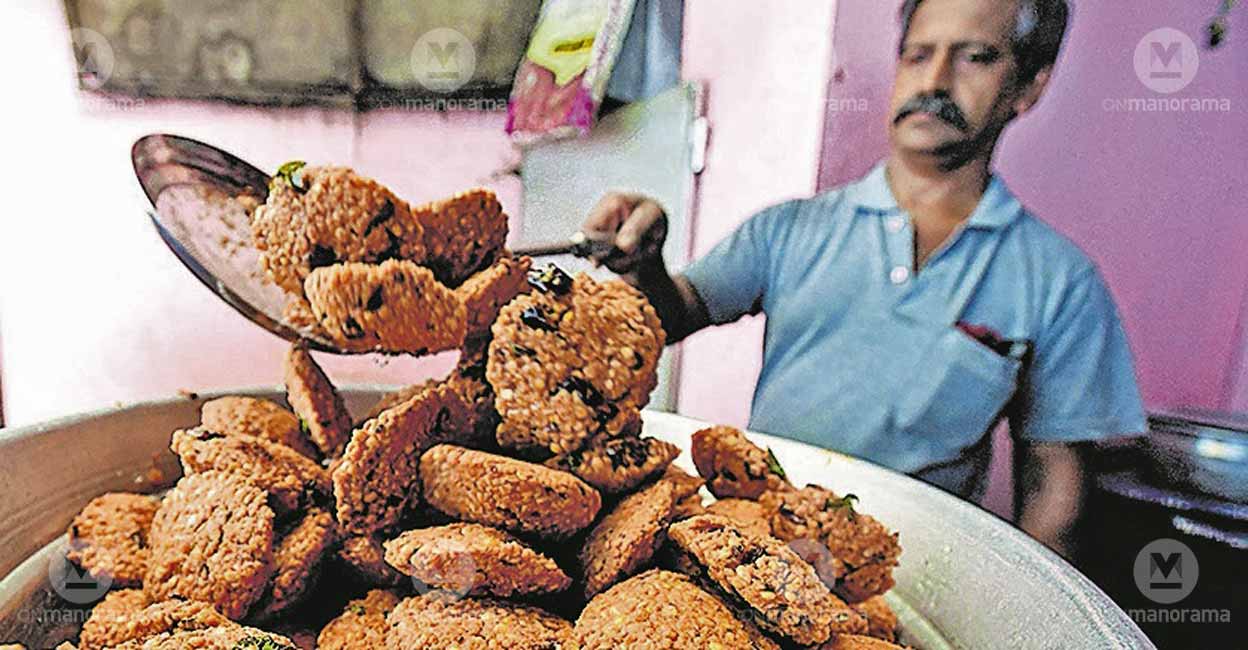 The Plavelil Hotel near Perissery in Alappzuha district is the favourite hub for tea time snacks. P S Manoharan, who runs the Plavelil Hotel near Perissery in Alappzuha district, stacking up freshly made parippuvadas. Photo: Manorama