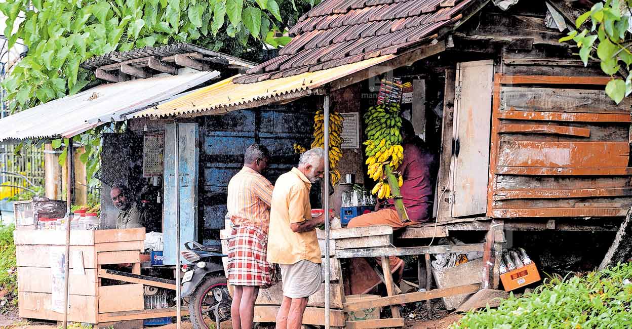 pathanamthitta-koduman-old-shops A drinks stall and a small shop next to it, both run by men named Viajyakumar, at Kodumon on the side of the Angadical Road. The one on the left is 30 years old while the other one started 15 years ago. Photo: Manorama