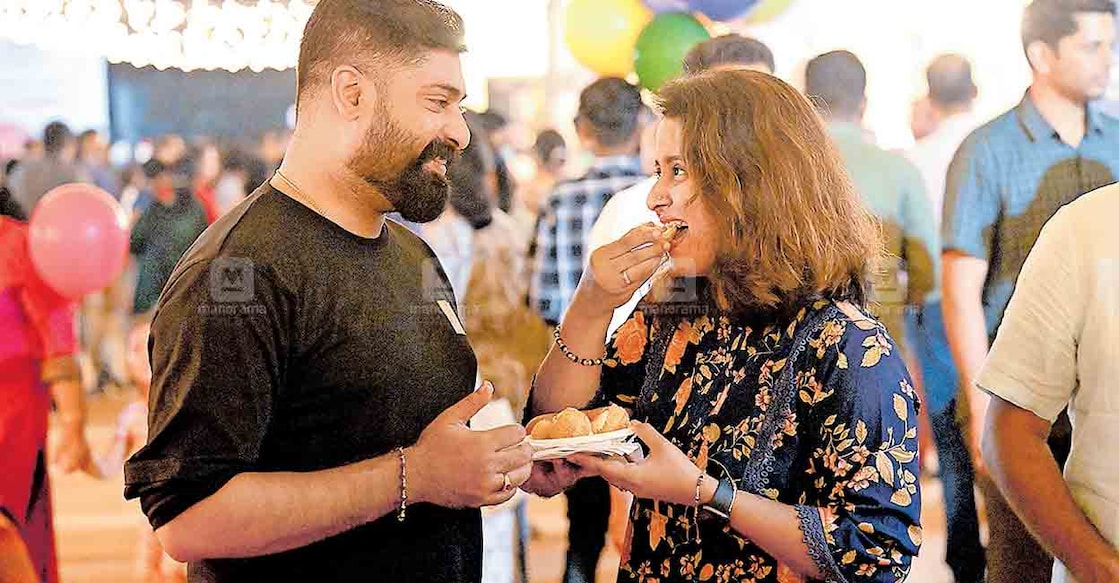 Craving some lip-smacking dinner? Head to the Kottayam food fest now Visitors enjoying a snack at the food fest ground. Photo: Manorama