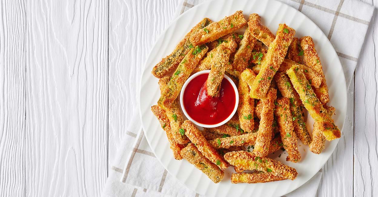 zuchhini-fries The next time you feel like snacking on something fried, try something different, like zucchini fries. Photo: Shutterstock/from my point of view