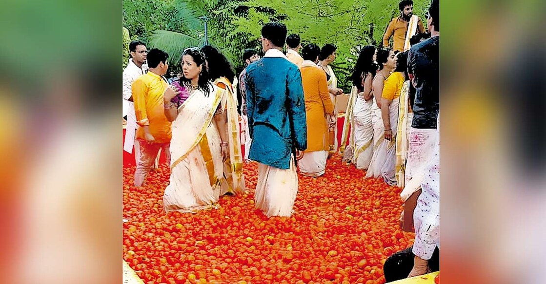 The celebration modelled after Spain’s famous La Tomatina festival marked the union of Nishta, from Noida, Uttar Pradesh, and Krith, a Delhi native, at the Gokulam Grand Resort at Kumarakom. Photo: Manorama